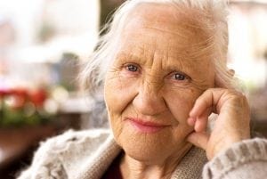 Thinking elderly woman